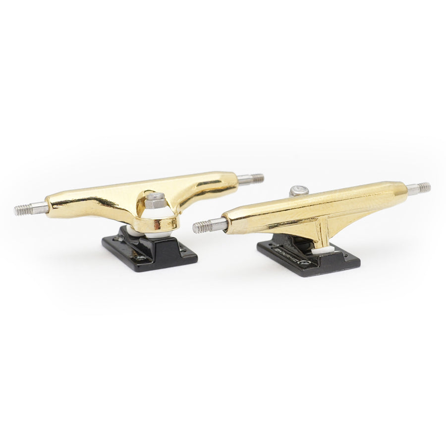 dynamic trucks 34mm width gold hanger black baseplate