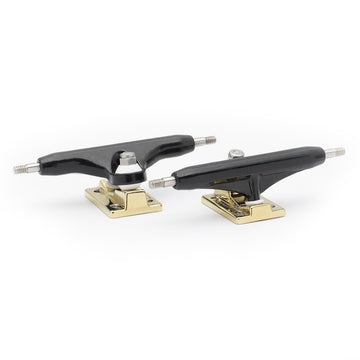 dynamic trucks 34mm width black hanger gold baseplate