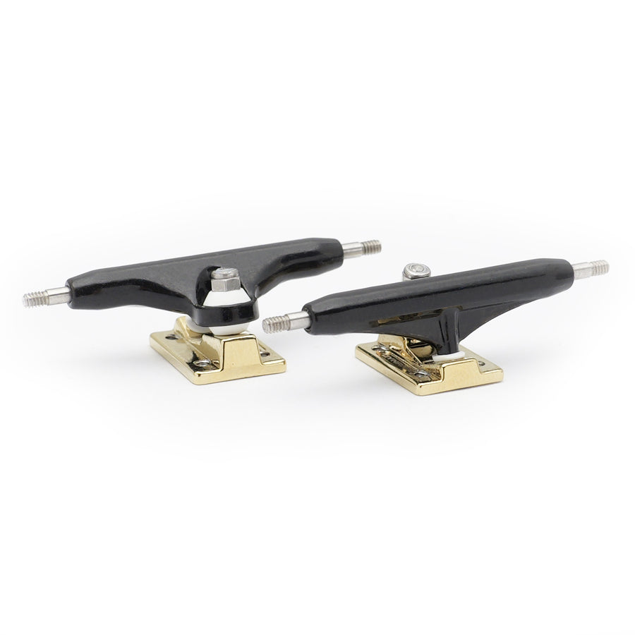 dynamic trucks 34mm width black hanger gold baseplate