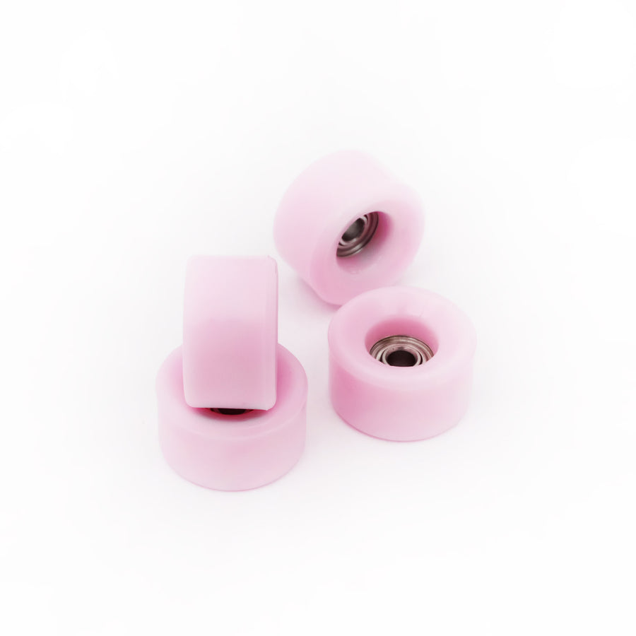 set of 4 bearing wheels cruiser shape 8mm diameter pink color